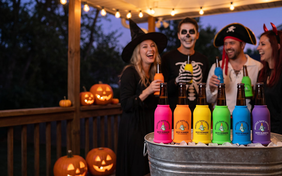 Friends in Halloween costumes with colorful Beer Rubbers on bottles in an ice bucket